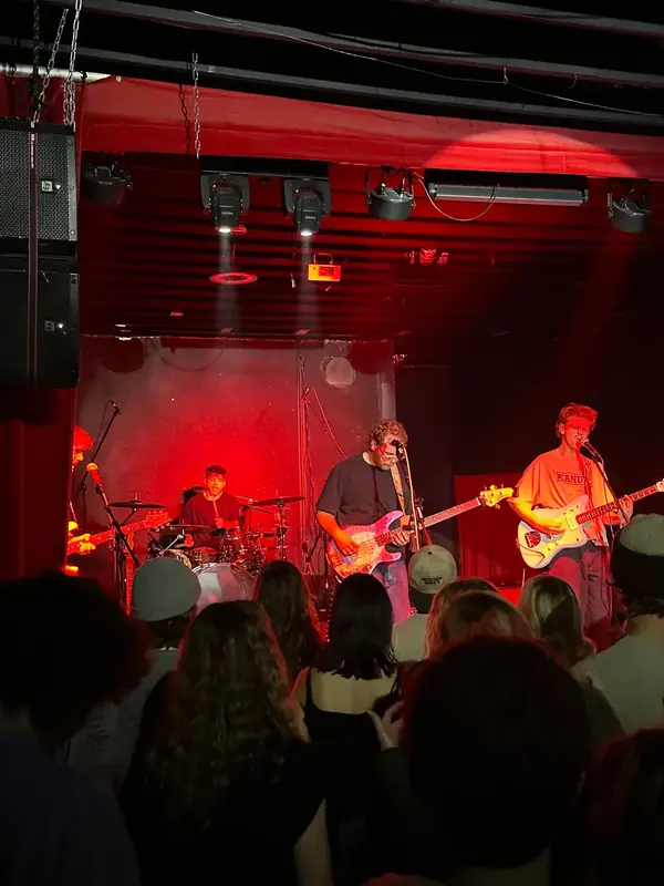 DogPaw playing their very first show in a basement sports court