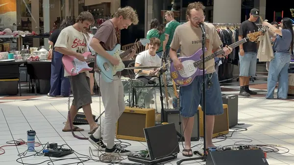 DogPaw playing the Provo Farmers Market in front of the mall shops