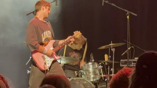 DogPaw guitarist and drummer lit up at The Depot